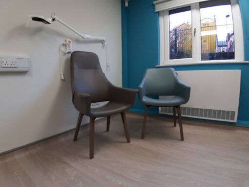 6 Consultation rooms at Bolton Hospice Interior Design and Furniture FF&E, refurbishment, healthcare interior design and refurbishment. Modern high and low back chairs, examination couches.