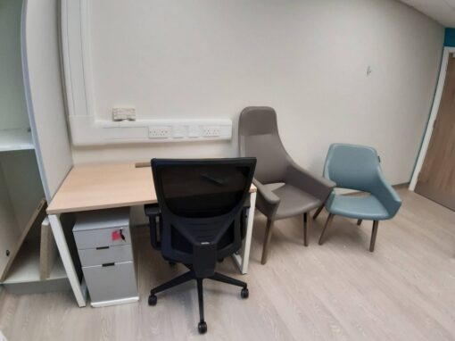 1 Consultation rooms at Bolton Hospice Interior Design and Furniture FF&E, refurbishment, healthcare interior design and refurbishment. Modern high and low back chairs, examination couches.