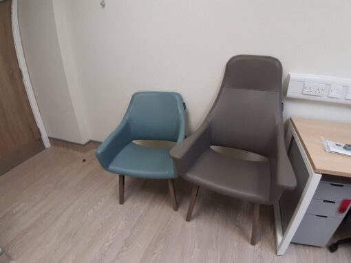 2 Consultation rooms at Bolton Hospice Interior Design and Furniture FF&E, refurbishment, healthcare interior design and refurbishment. Modern high and low back chairs, examination couches.