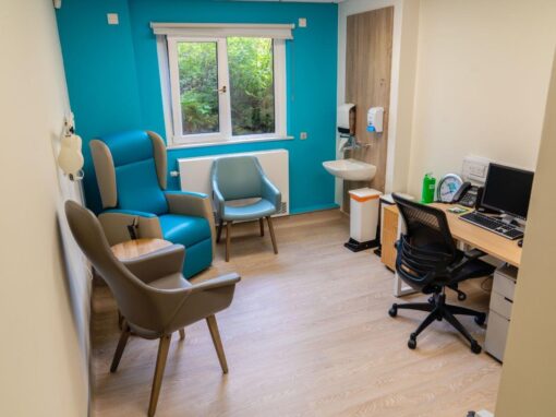 9 Consultation rooms at Bolton Hospice Interior Design and Furniture FF&E, refurbishment, healthcare interior design and refurbishment. Modern high and low back chairs, examination couches.