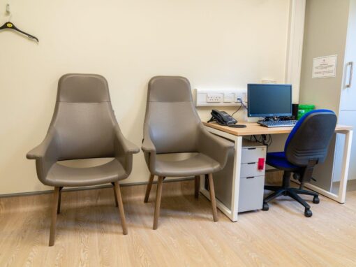 12 Consultation rooms at Bolton Hospice Interior Design and Furniture FF&E, refurbishment, healthcare interior design and refurbishment. Modern high and low back chairs, examination couches.