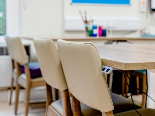 3 Activity room with height-adjustable tables and healthcare faux leather upholstery, Bolton Hospice Interior Design and Furniture FF&E, refurbishment, healthcare interior design and refurbishment,