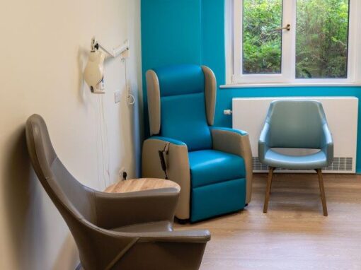 7 Consultation rooms at Bolton Hospice Interior Design and Furniture FF&E, refurbishment, healthcare interior design and refurbishment. Modern high and low back chairs, examination couches.