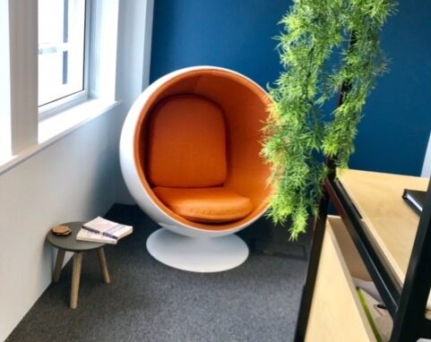Ball chair breakout area, Workplace Office Interior Design, Core Comm office interior design, commercial interior design and fit-out